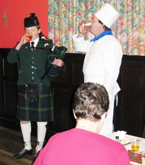 Piper and chef enjoy a dram