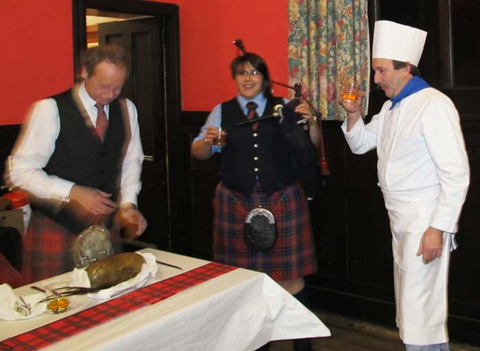 Piper and chef enjoy a dram